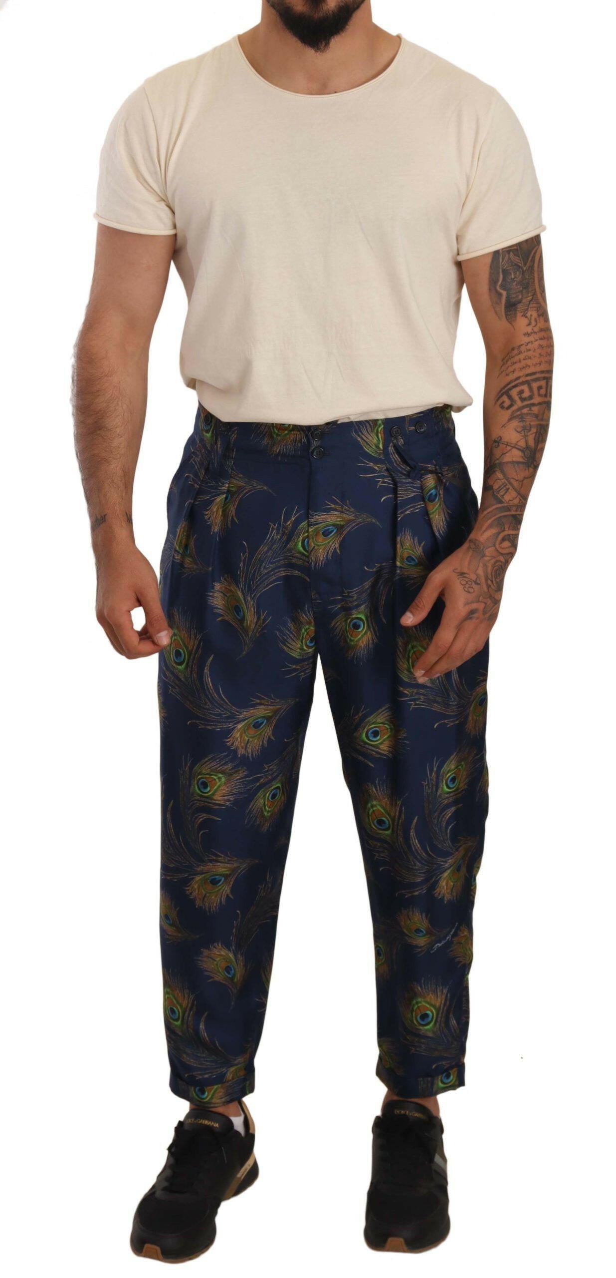 Dolce &amp; Gabbana – Karottenhose aus Seide mit blauem Pfauenmuster