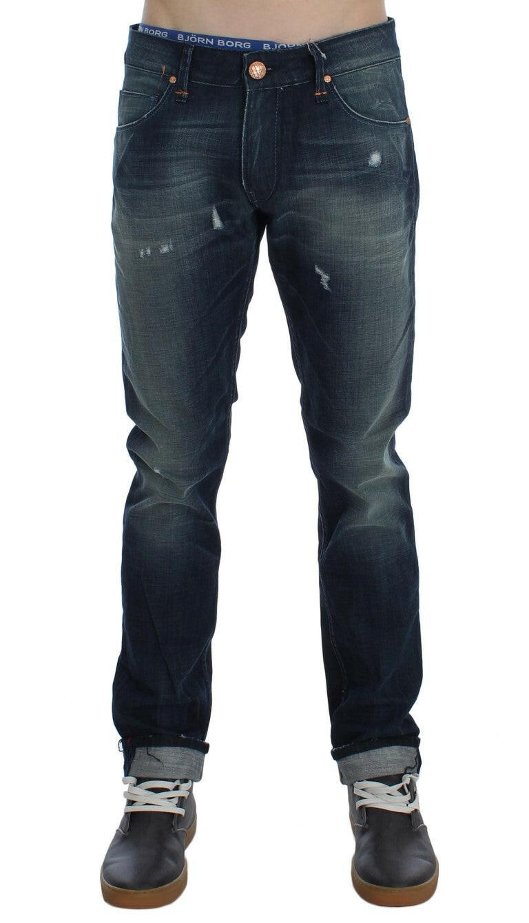 Acht Slim Fit Jeans aus Baumwolldenim in blauer Waschung