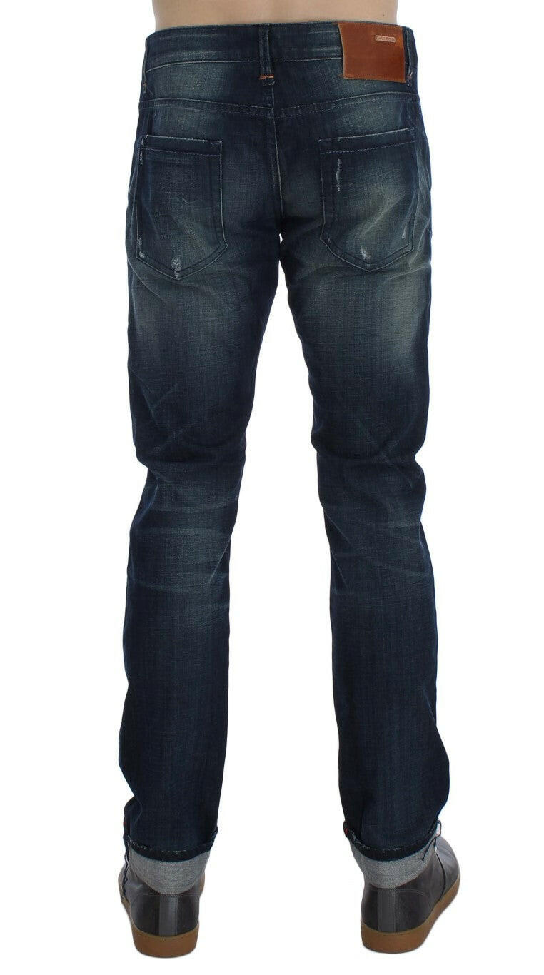 Acht Slim Fit Jeans aus Baumwolldenim in blauer Waschung