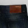Acht Slim Fit Jeans aus Baumwolldenim in blauer Waschung