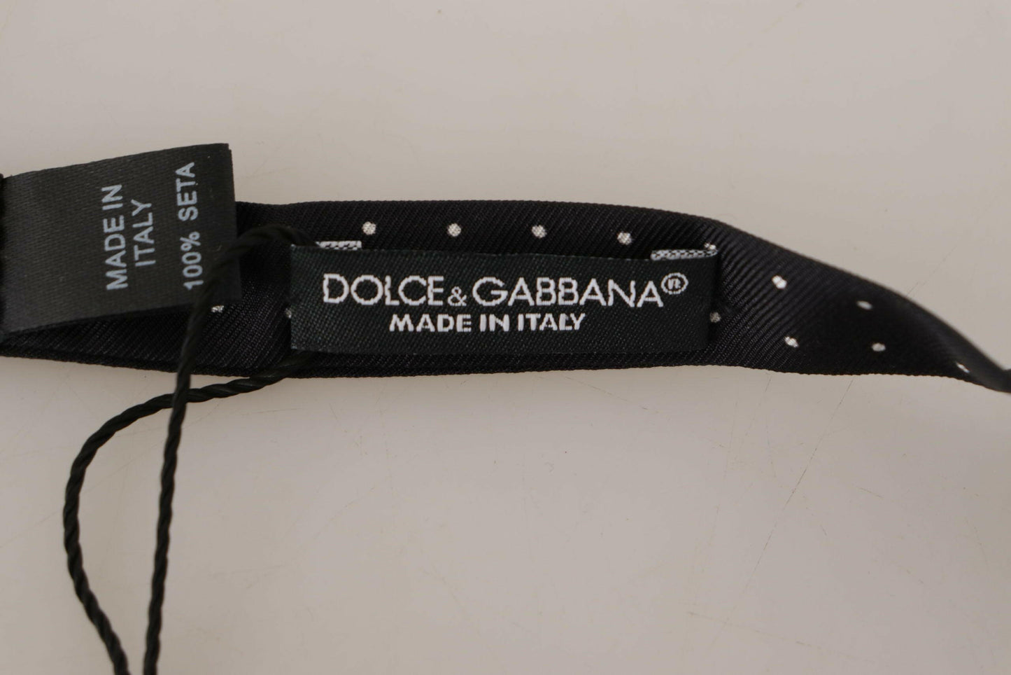 Dolce &amp; Gabbana Élégant nœud papillon en soie à pois noirs