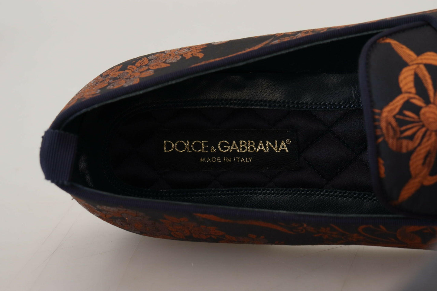 Dolce &amp; Gabbana – Hausschuhe mit Blumenmuster in Blau und Rostrot