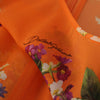Dolce &amp; Gabbana – Orangefarbene Bluse mit Blumenmuster und langen Ärmeln