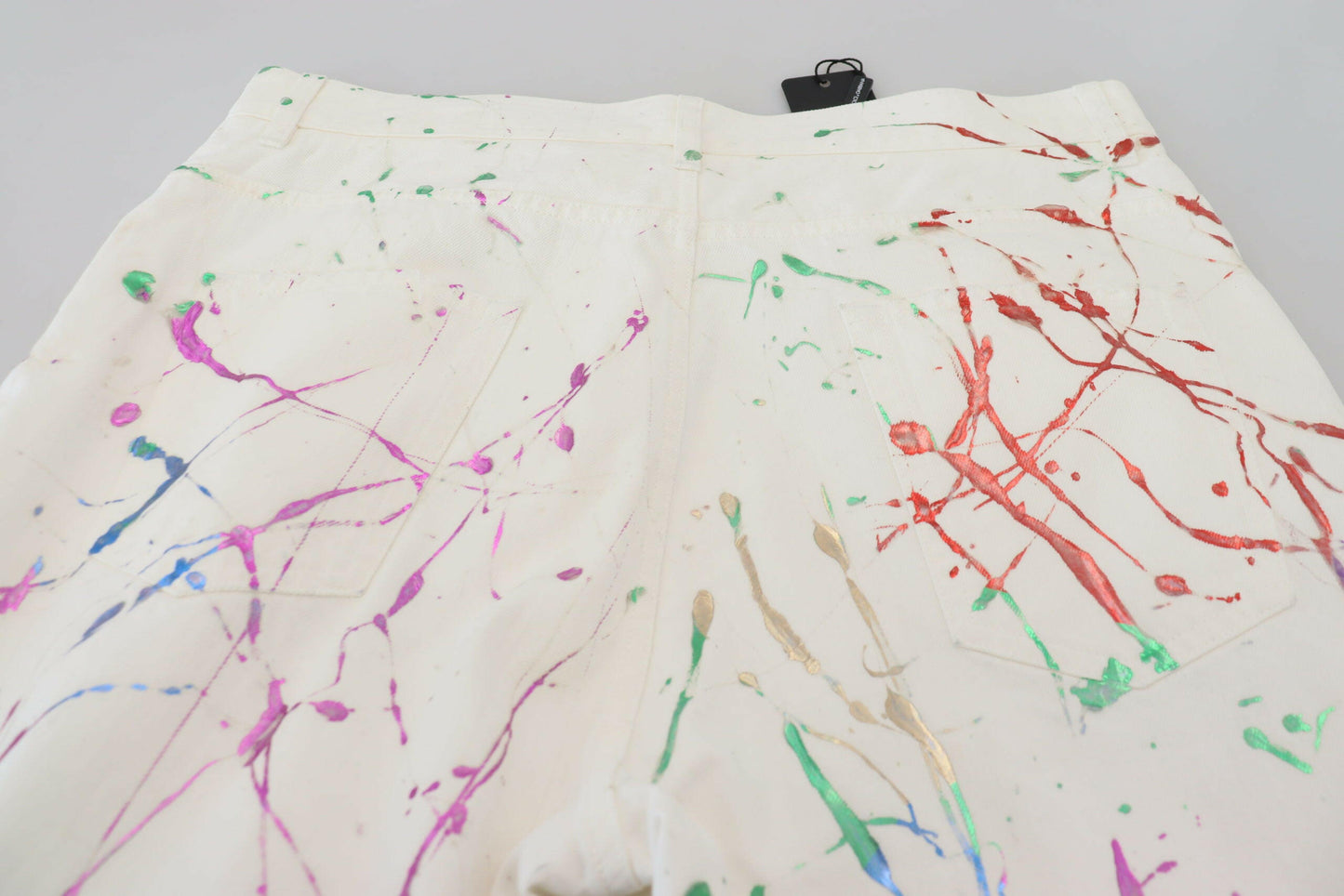 Dolce &amp; Gabbana – Weiße Jeanshose aus Baumwolle mit Farbspritzer-Print