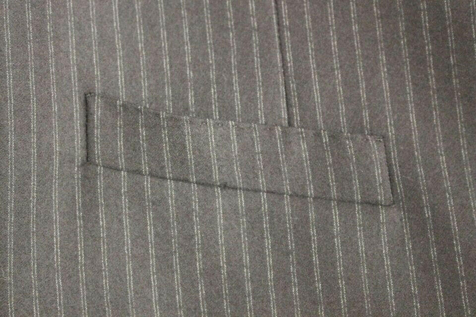 Dolce &amp; Gabbana – Einreihige Weste aus schwarz gestreifter Wolle