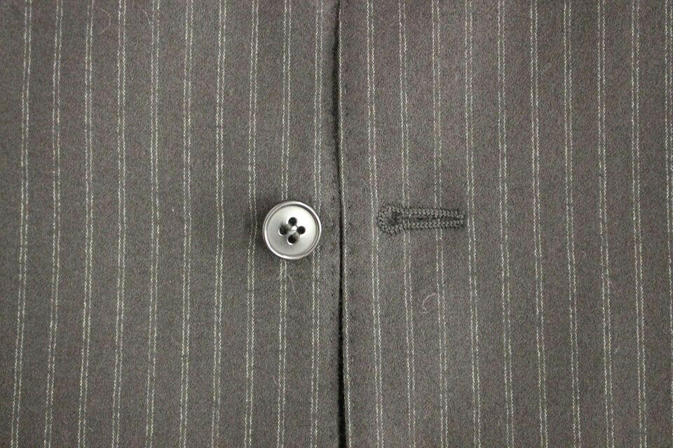 Dolce &amp; Gabbana – Einreihige Weste aus schwarz gestreifter Wolle