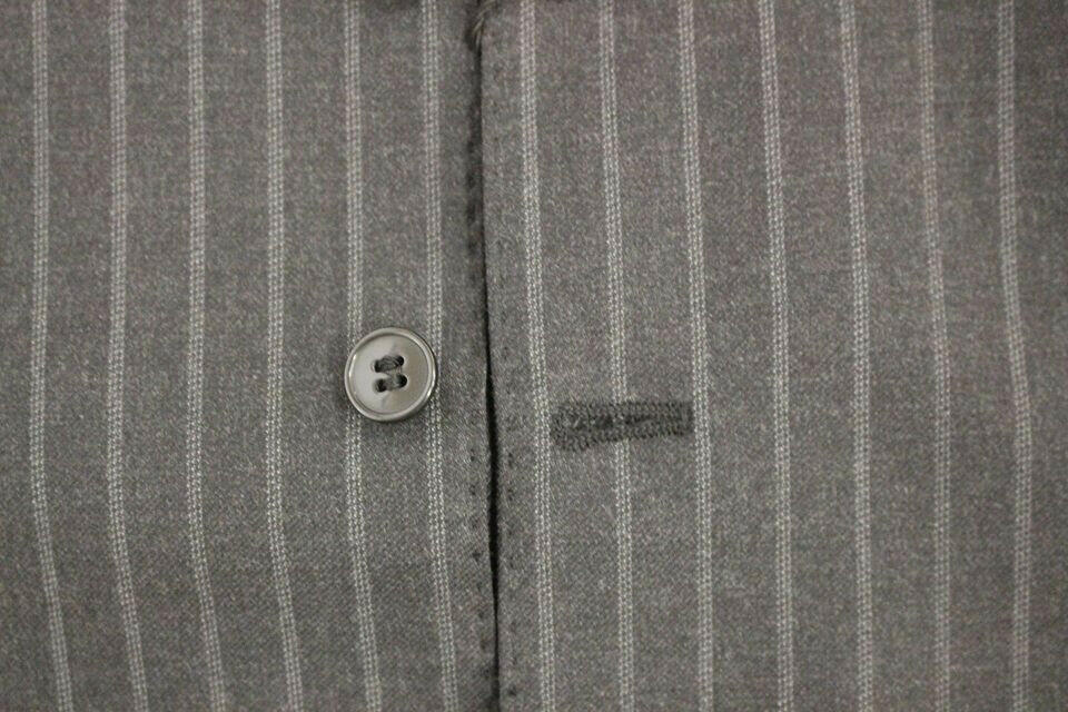 Dolce &amp; Gabbana Élégant gilet en laine à rayures grises