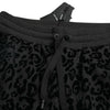 Dolce &amp; Gabbana – Schwarze Jogginghose aus Baumwolle mit Leopardenmuster und schmaler Passform