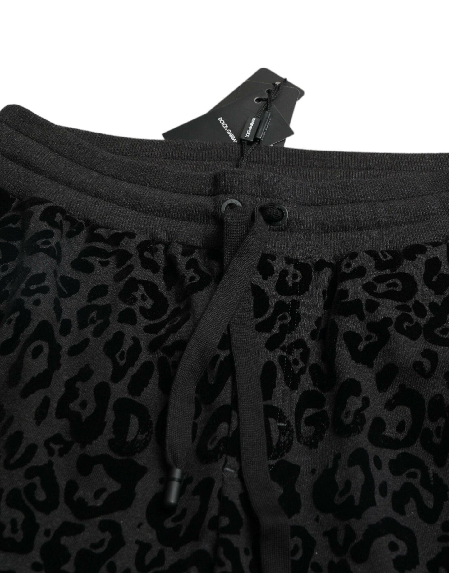 Dolce &amp; Gabbana – Schwarze Jogginghose aus Baumwolle mit Leopardenmuster und schmaler Passform