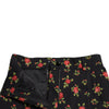 Dolce &amp; Gabbana – Schwarze, hoch taillierte Karottenhose aus Wolle mit Blumenmuster