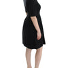 CO|TE Black short sleeve venus dress