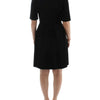 CO|TE Black short sleeve venus dress