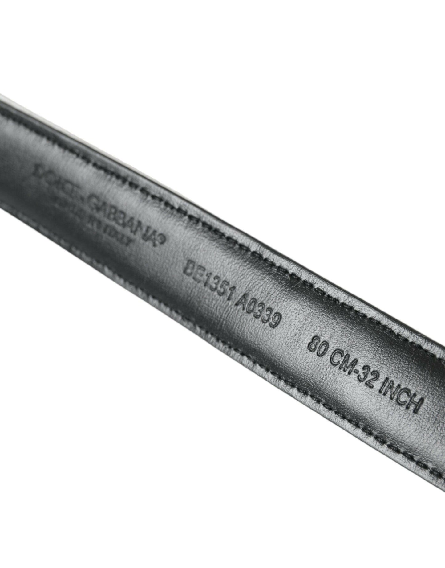 Dolce &amp; Gabbana Schwarz-weißer Patchwork-Gürtel mit goldener Metallschnalle