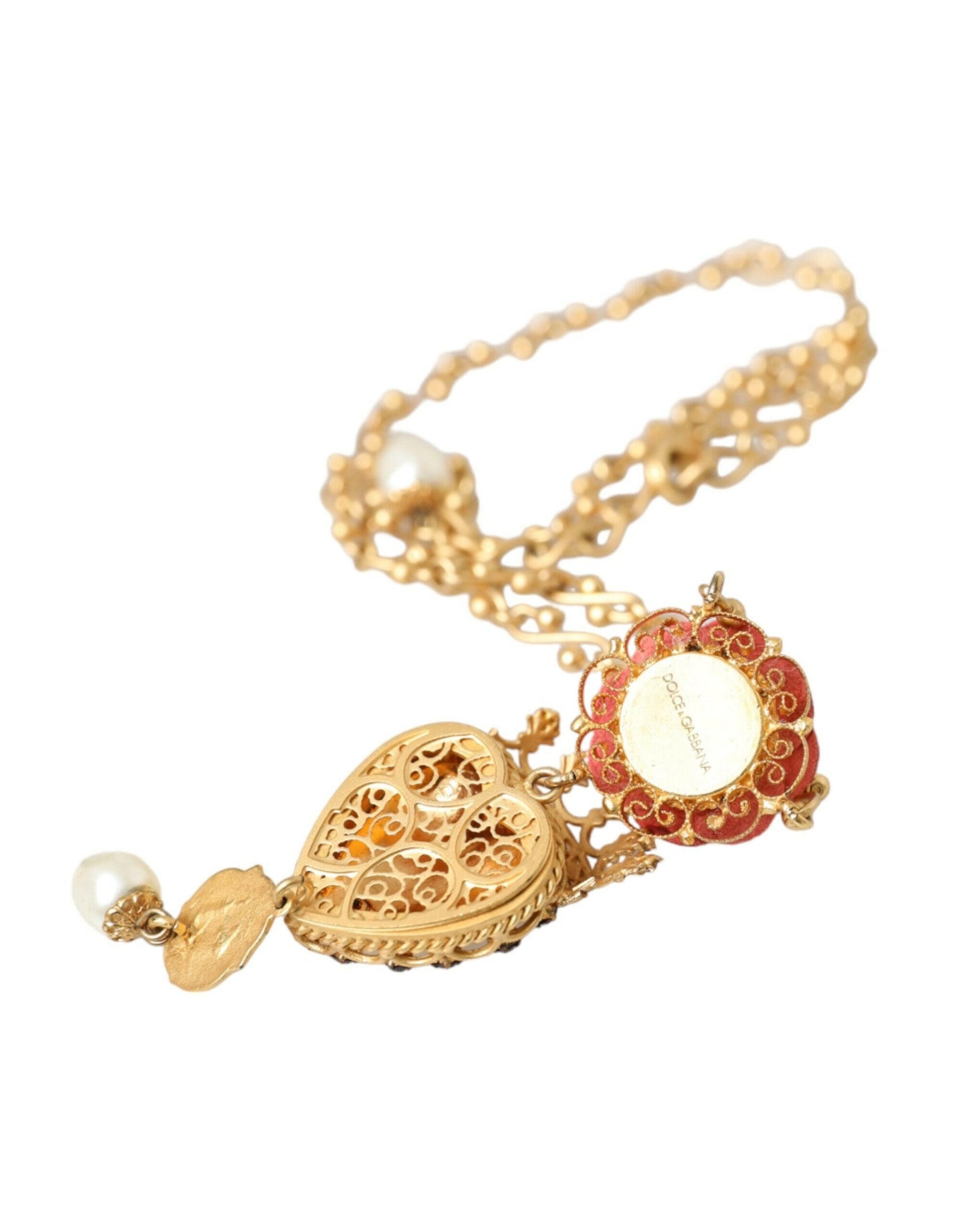 Collier Dolce &amp; Gabbana en laiton doré avec pendentif en cristal rose Sacré-Cœur