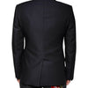 Blazer-manteau simple boutonnage en laine bleu foncé Dolce &amp; Gabbana