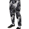 Dolce &amp; Gabbana – Caprihose aus Baumwollstretch mit Bananenblattmuster in Grau