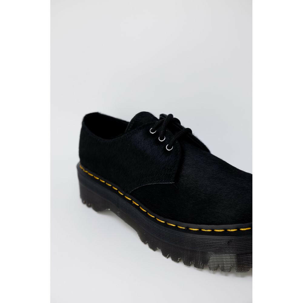 Dr. Martens Schnürstiefel aus schwarzem Leder