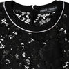 Dolce &amp; Gabbana – Schwarze Bluse aus Seiden-Pullover mit Blumenspitze