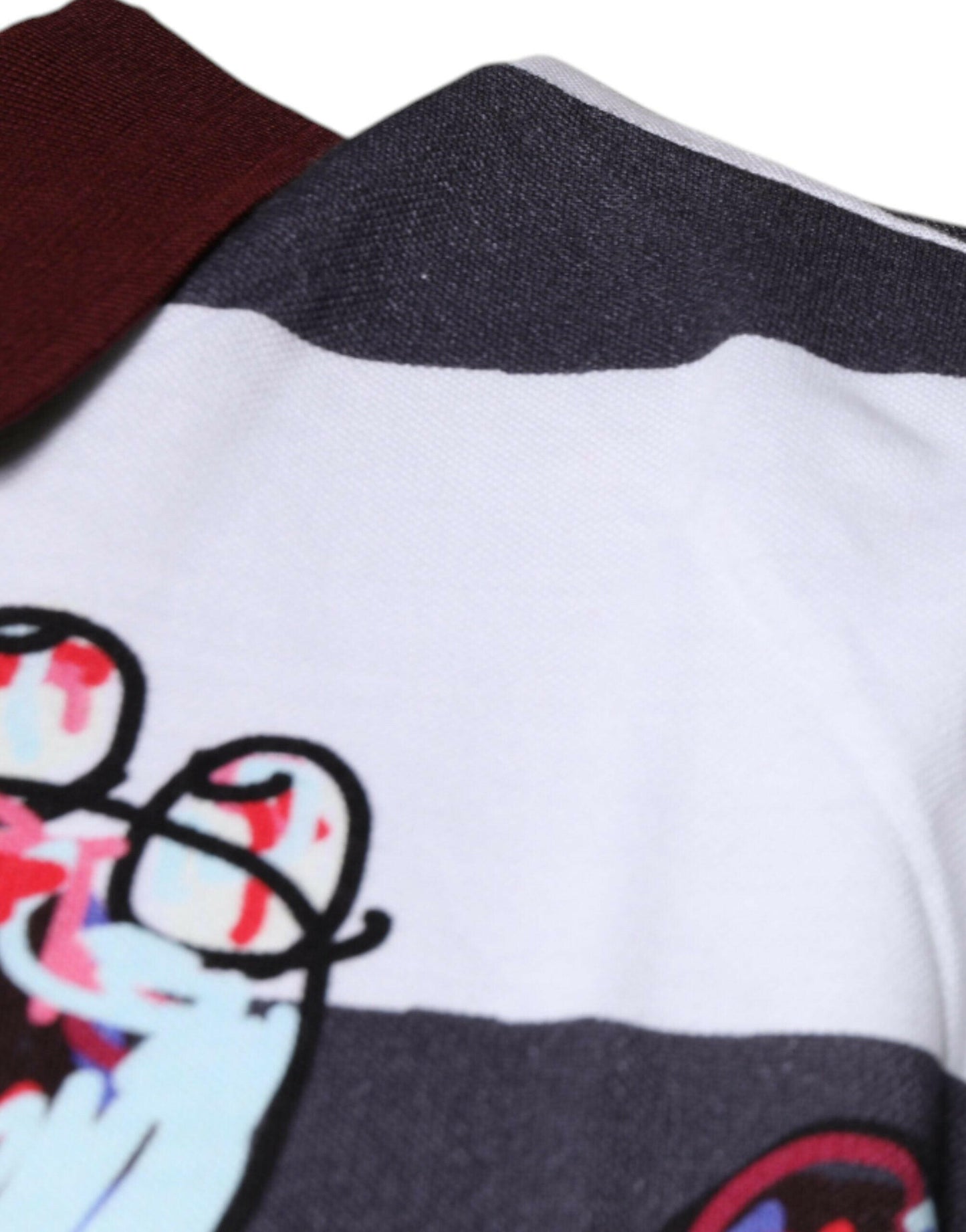 Dolce &amp; Gabbana – Poloshirt mit mehrfarbigem Grafikkragen