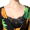 Dolce &amp; Gabbana Schwarzes Wickelkleid aus Seide mit Ananas-Print
