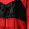 Dolce &amp; Gabbana – Rot-schwarzes Oberteil mit langen Ärmeln und Bustier-Detail