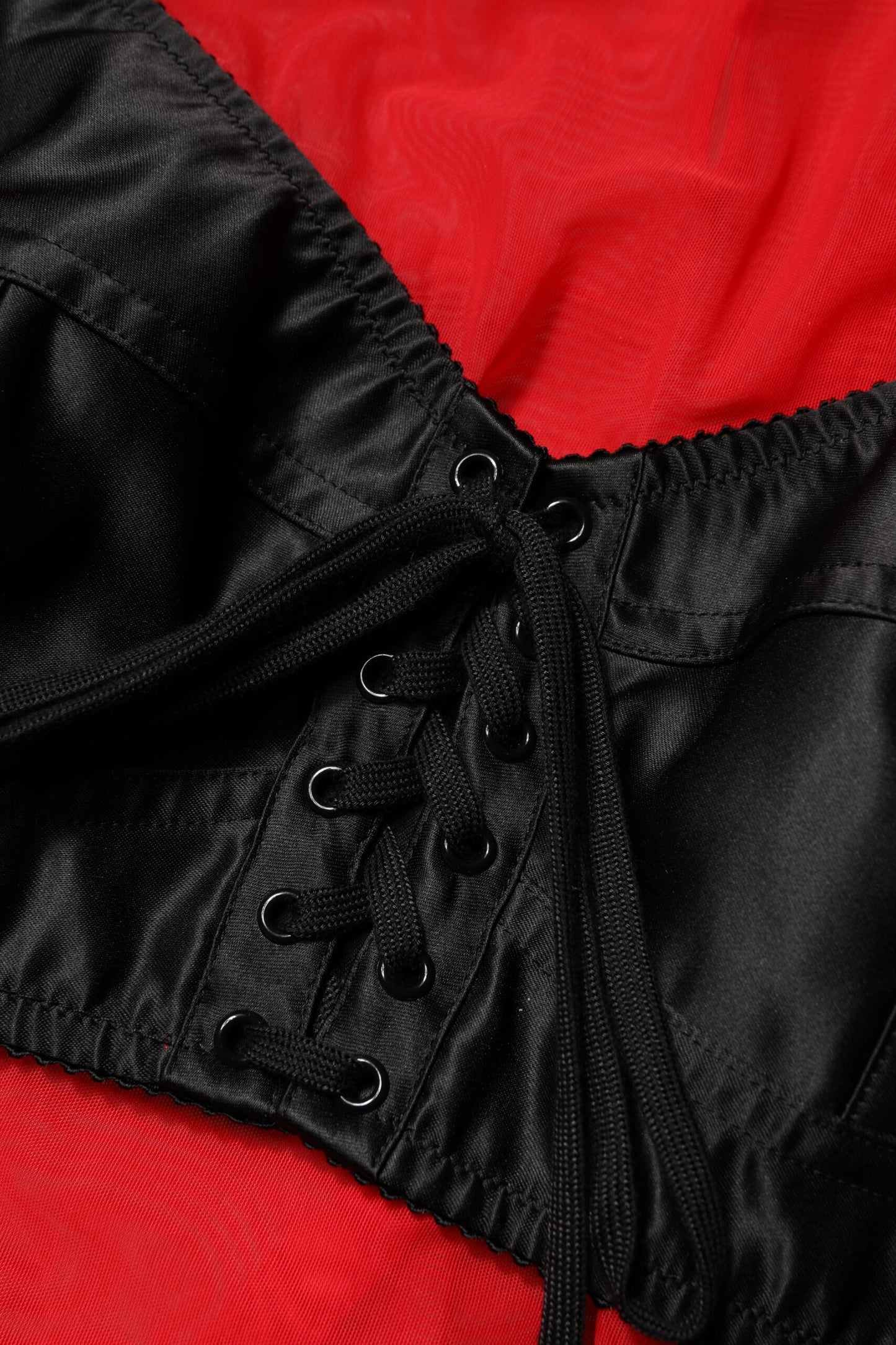 Dolce &amp; Gabbana – Rot-schwarzes Oberteil mit langen Ärmeln und Bustier-Detail