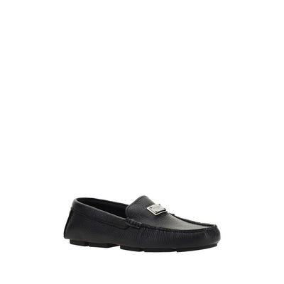 Dolce &amp; Gabbana Slipper aus schwarzem Gummi