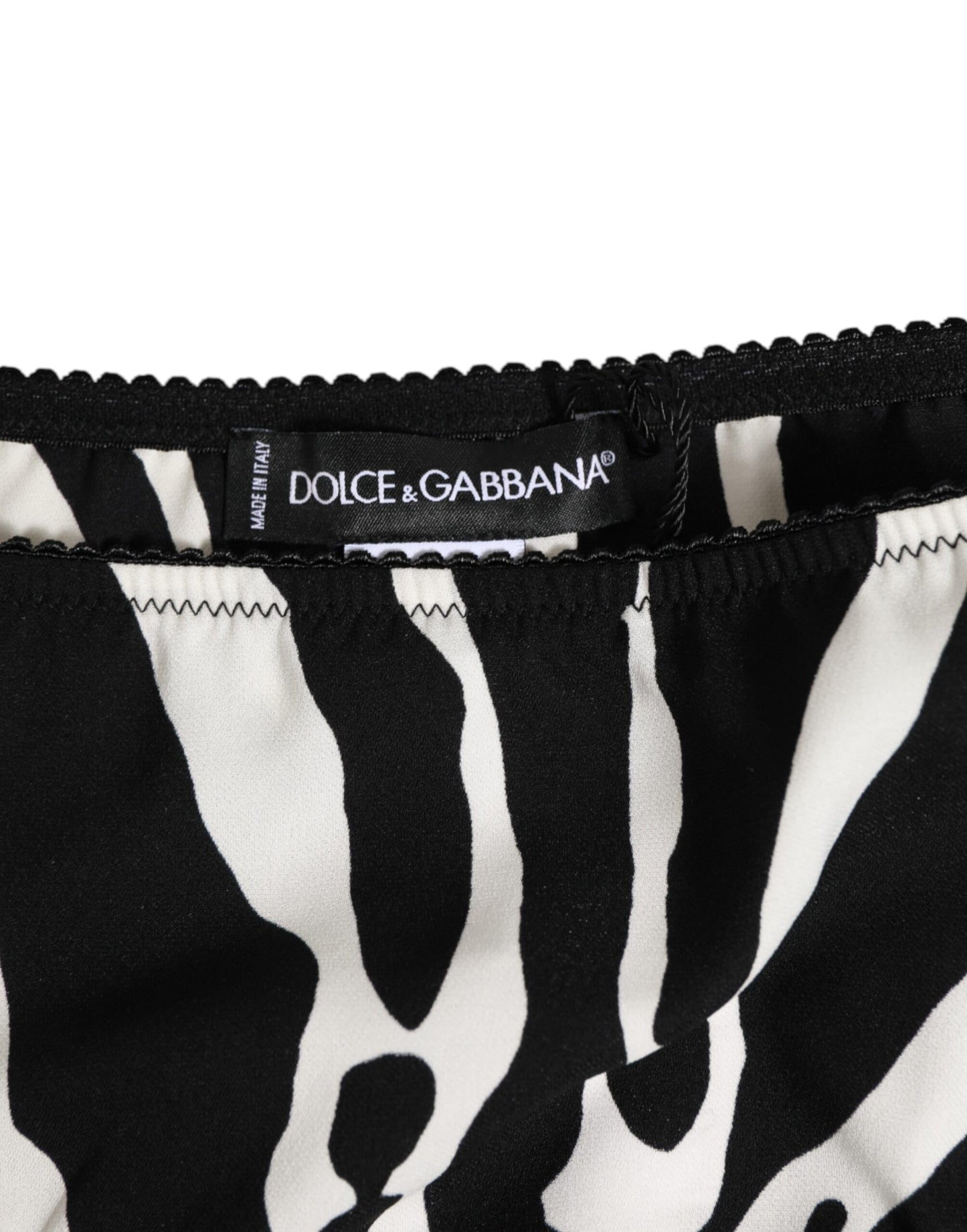 Dolce &amp; Gabbana Slip-Slips mit schwarzem und weißem Zebra-Print
