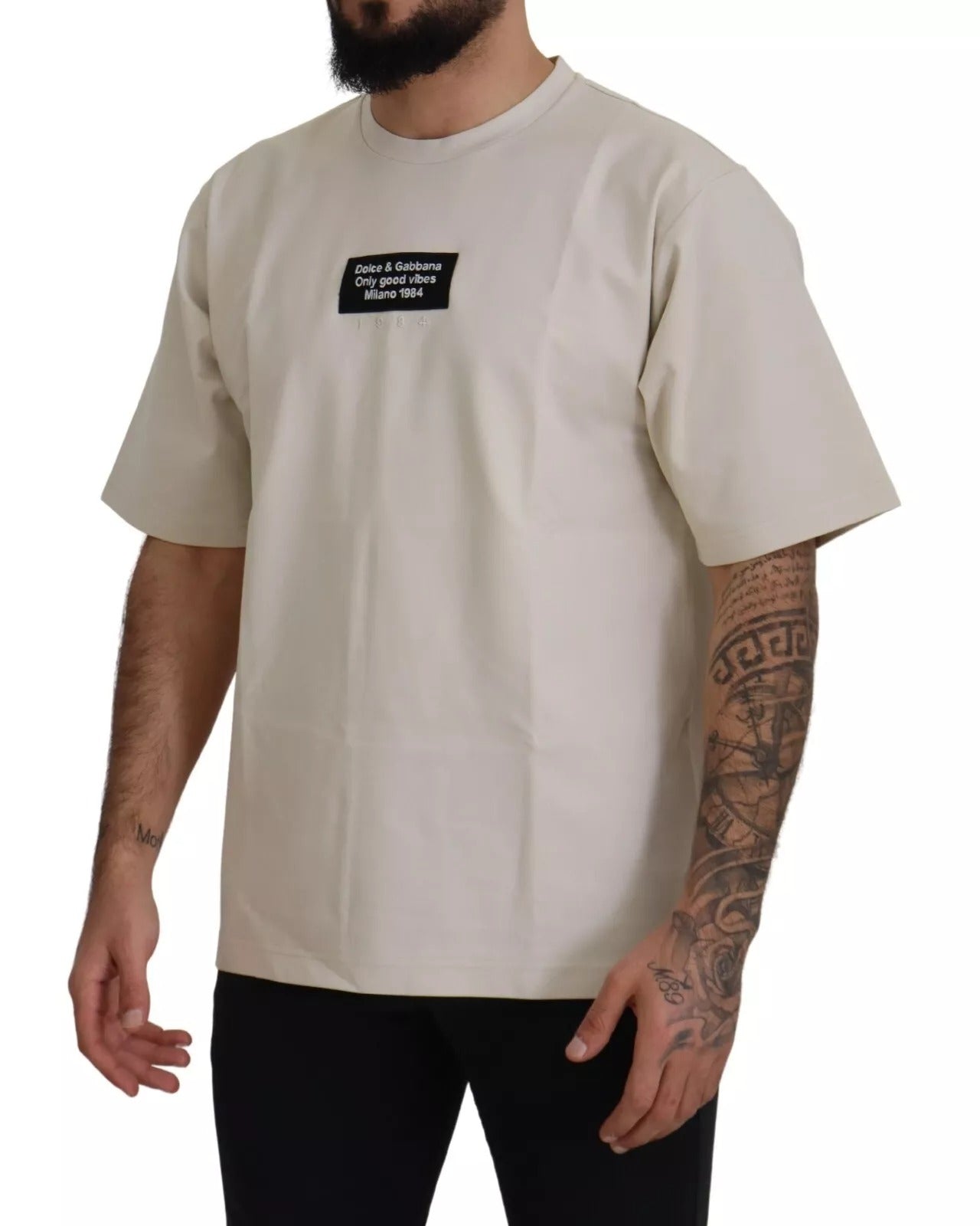 Dolce &amp; Gabbana Elfenbeinfarbener Baumwoll-Pullover mit Print und Rundhalsausschnitt