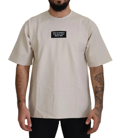 Dolce &amp; Gabbana Elfenbeinfarbener Baumwoll-Pullover mit Print und Rundhalsausschnitt