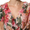Dolce &amp; Gabbana Bluse aus Seide mit rosa Kamelienprint und V-Ausschnitt