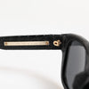 Dolce &amp; Gabbana DG4177 Sonnenbrille mit schwarzem Lederrahmen und getönten Gläsern