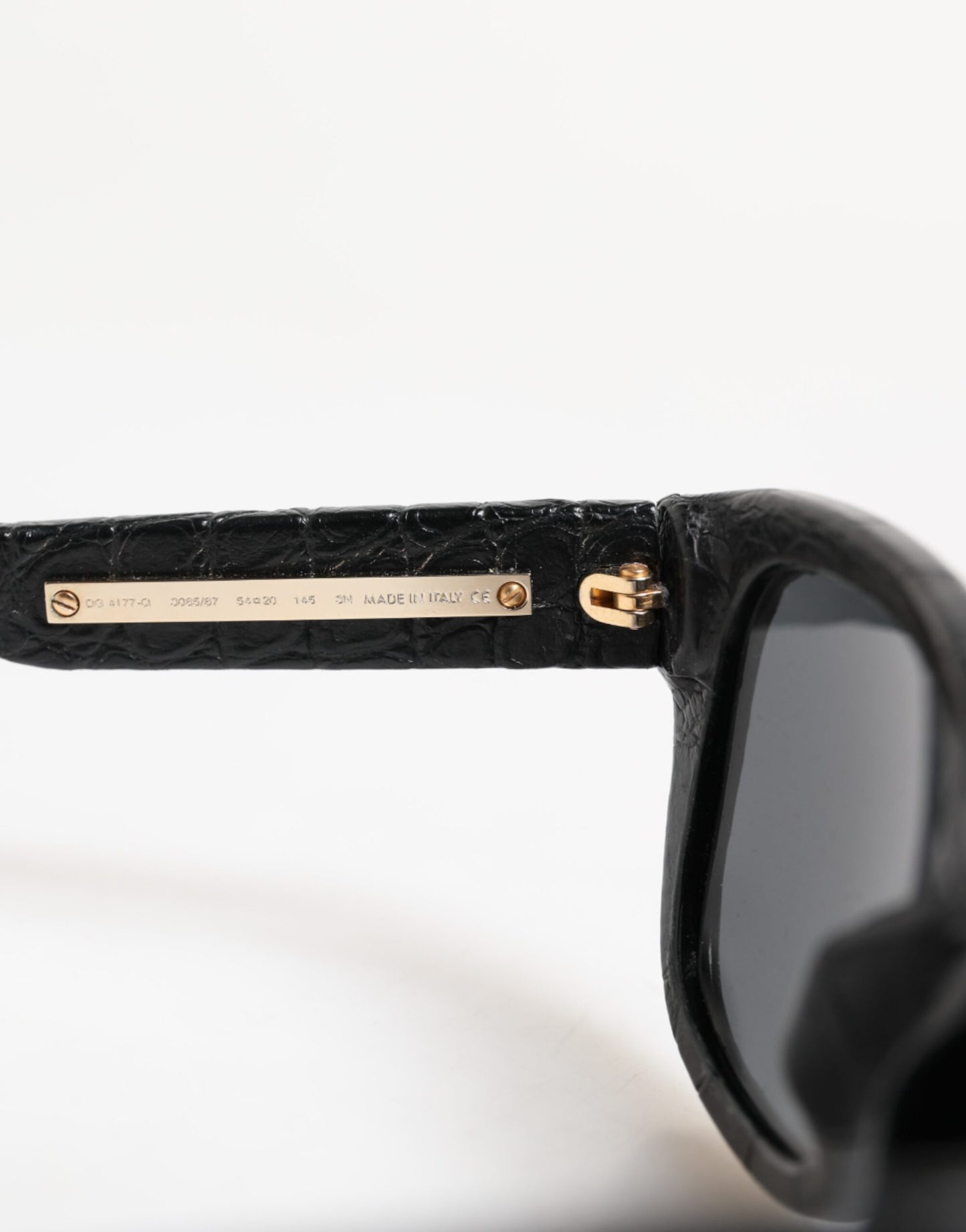 Dolce &amp; Gabbana DG4177 Sonnenbrille mit schwarzem Lederrahmen und getönten Gläsern