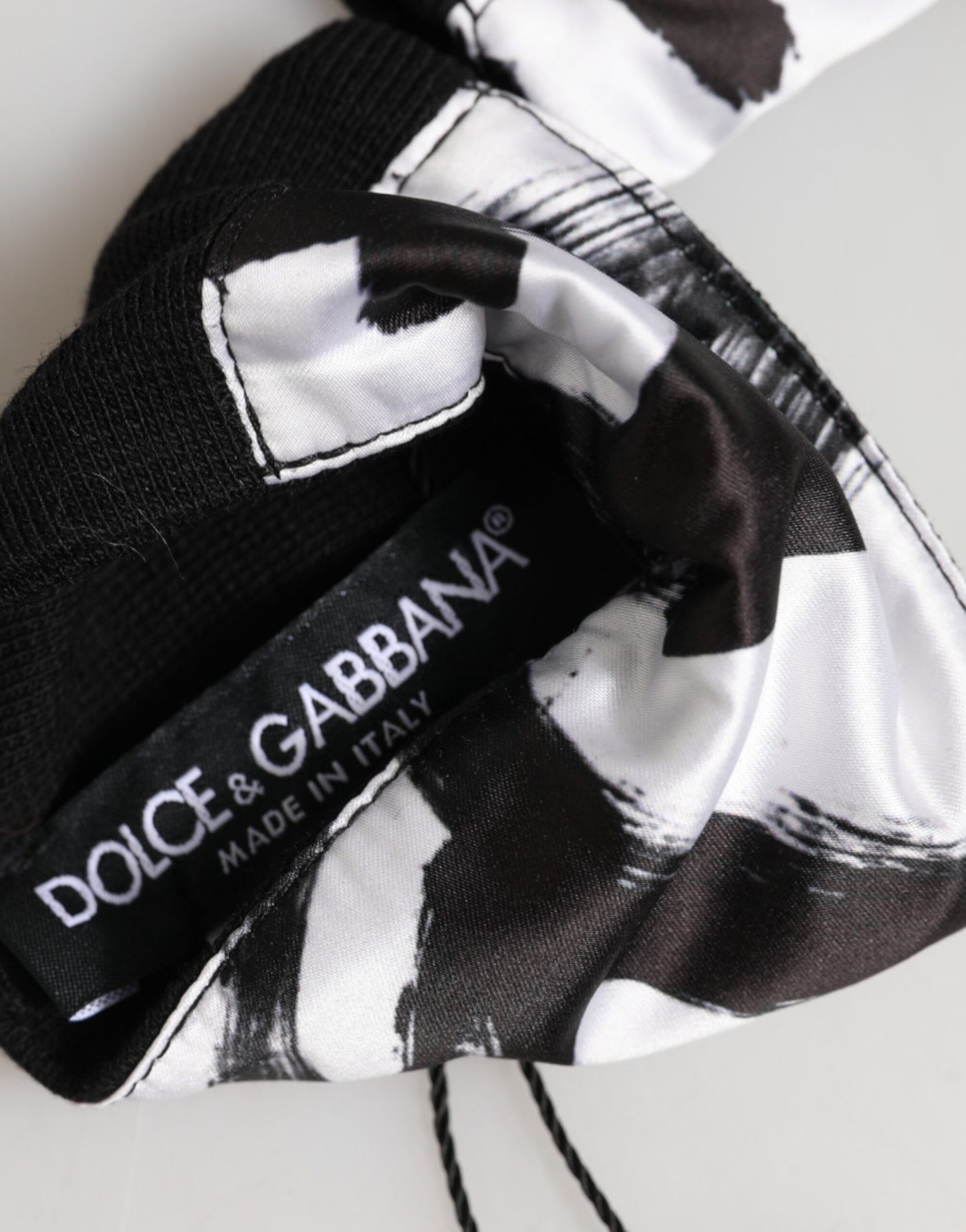 Dolce &amp; Gabbana Schwarzes und weißes DG-Logo-Seidenarmband (1 Paar)