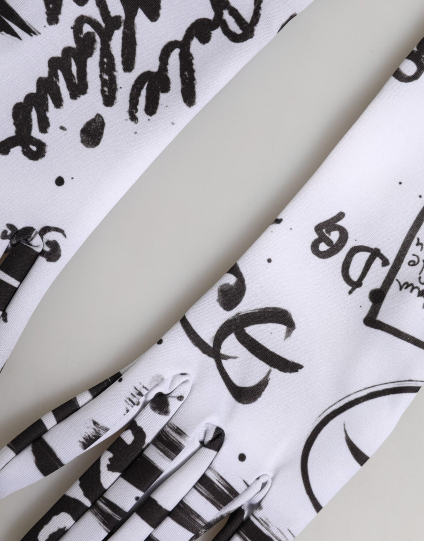 Dolce &amp; Gabbana Schwarze und weiße DG-Logo-Handschuhe in Ellbogenlänge