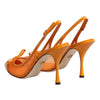 Dolce &amp; Gabbana Orangefarbene Slingback-Pumps aus Leder und Mesh