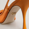 Dolce &amp; Gabbana Orangefarbene Slingback-Pumps aus Leder und Mesh