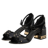 Dolce &amp; Gabbana Schwarze Sandalen mit Nieten und Knöchelriemen